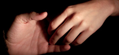 Picture of two hands touching