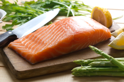 Salmon on cutting board