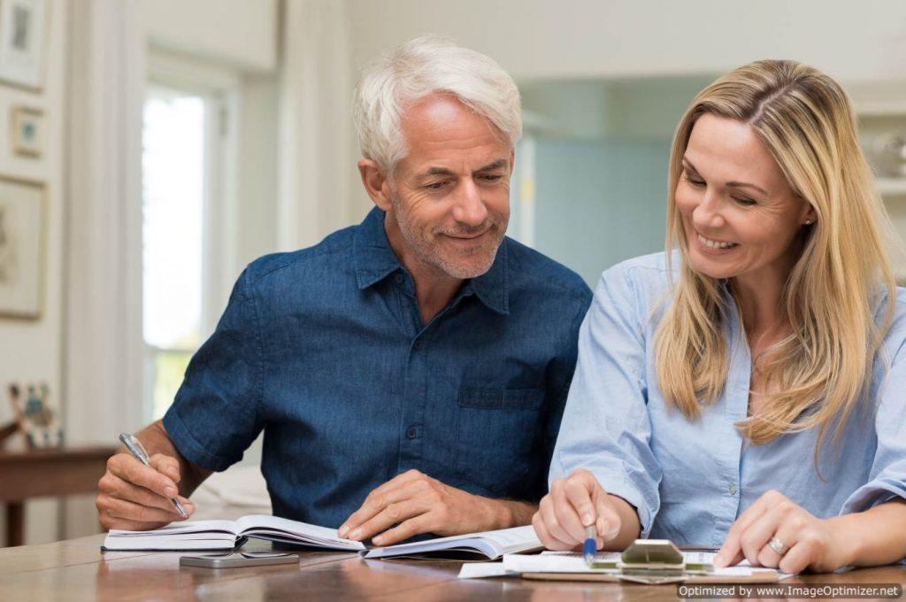 Couple examining document checklist
